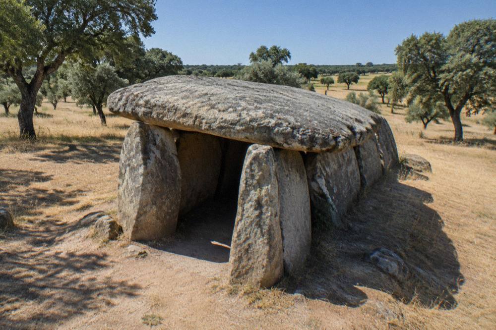 Great Dolmen of Zambujeiro standing among cork oaks in the Alentejo countryside