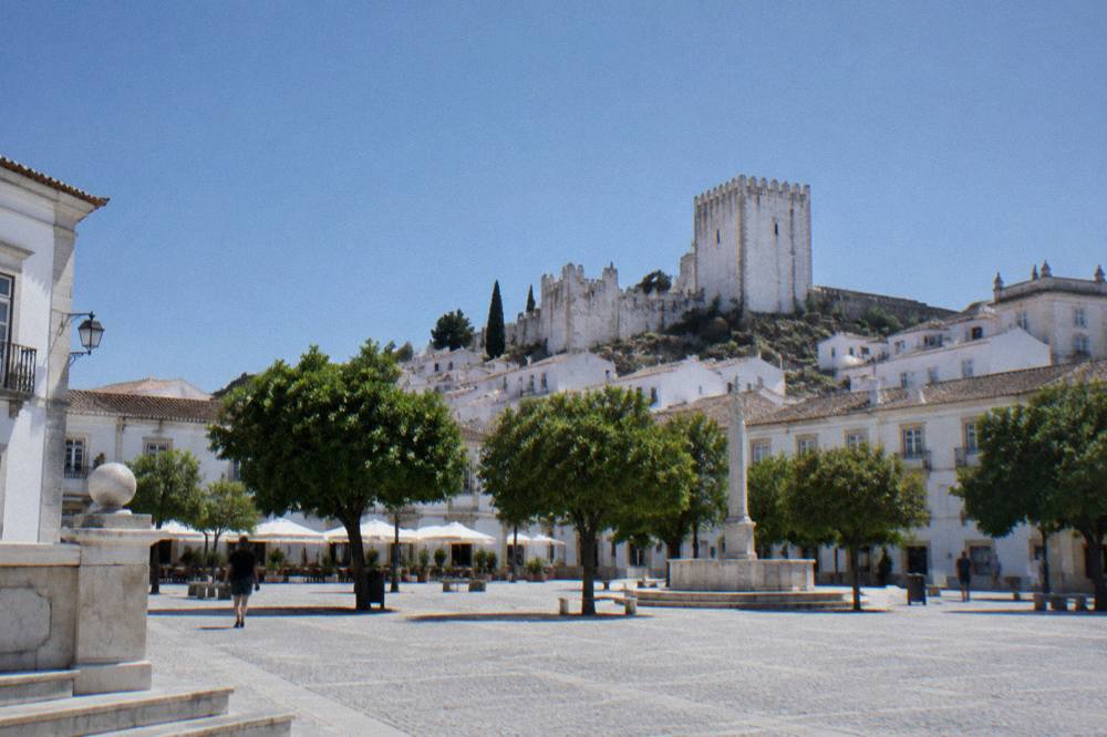 Marble pavement and white stone facades in a small Alentejo town street