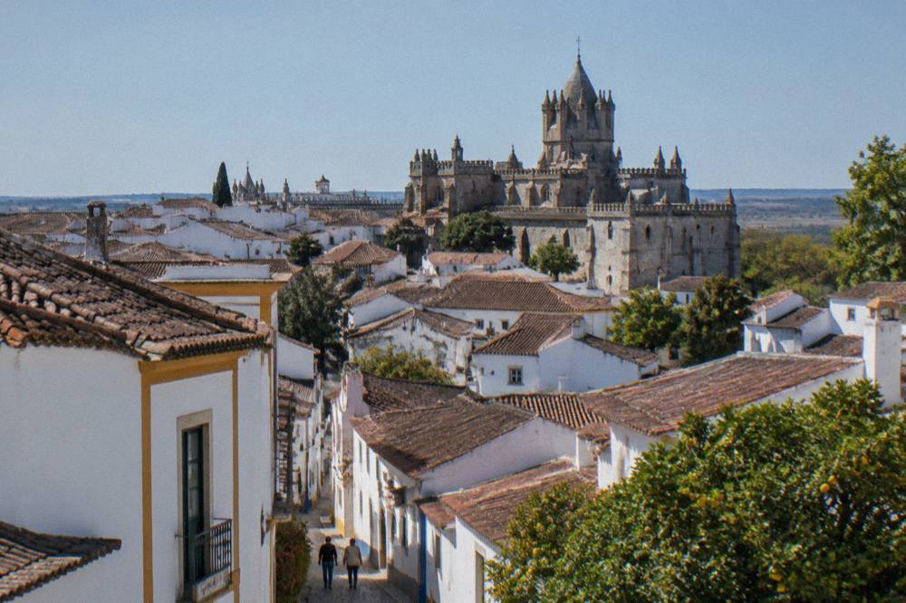 Panorama of whitewashed historic Évora with its cathedral and old rooftops