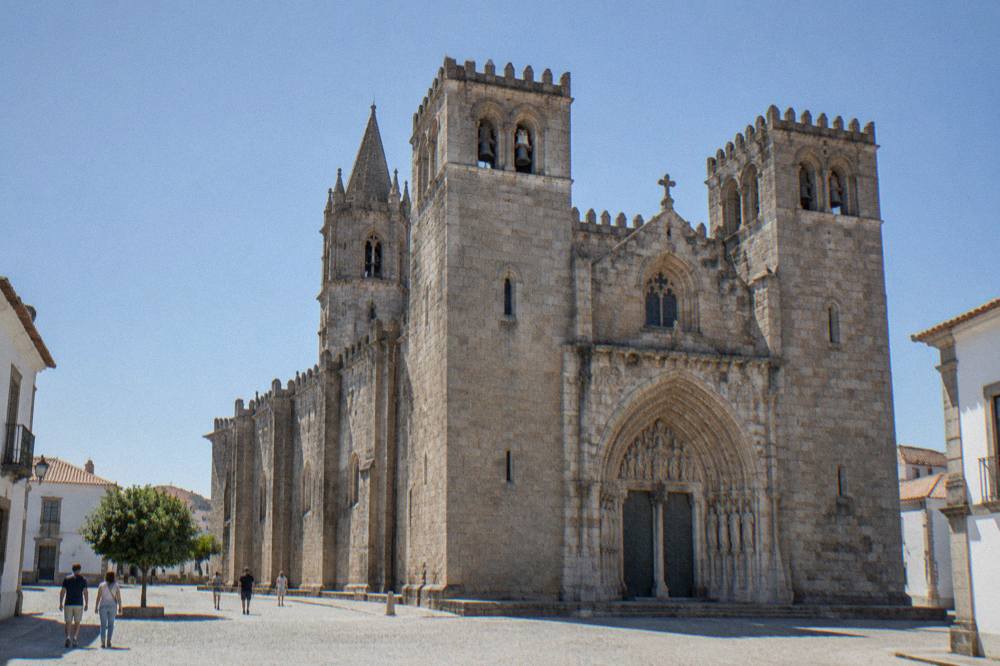 The carved west portal of Évora Cathedral with its apostle figures