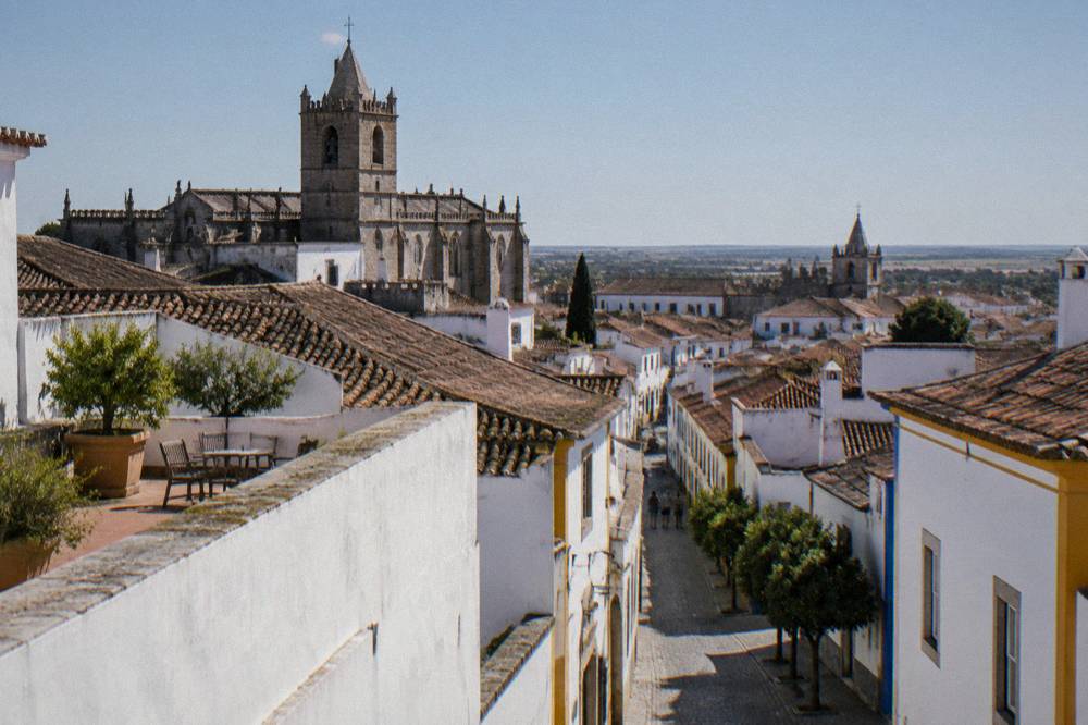 The cathedral roof terrace overlooking the tiled roofs and towers of Évora old town