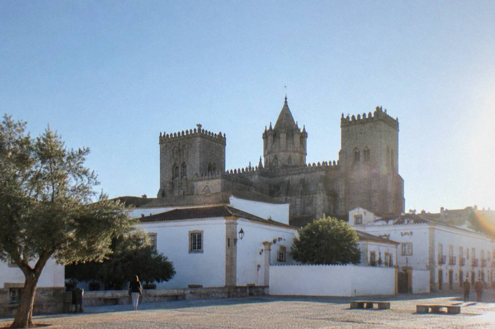 Évora Cathedral rising above the rooftops inside the city walls