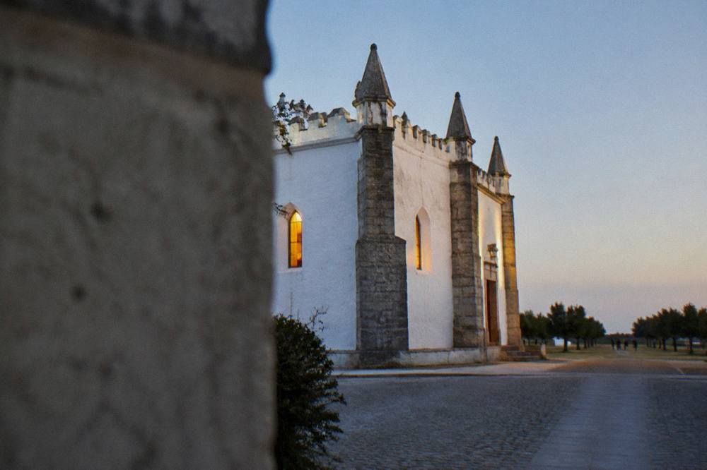 The Rossio de São Brás open ground on the edge of the old city of Évora at dusk