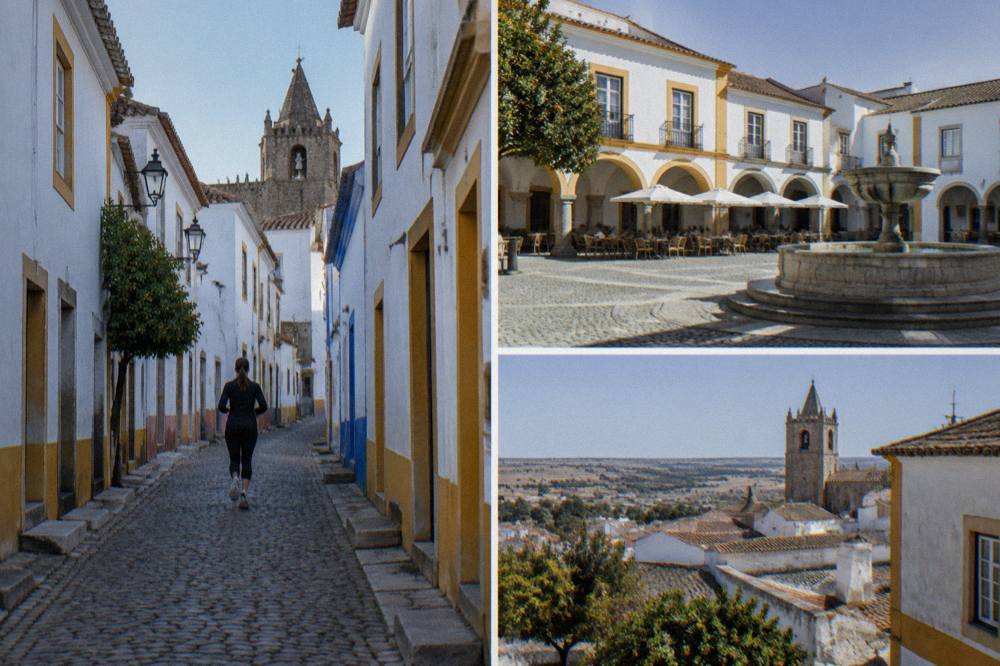 Arcaded square in Évora with cafe tables and a fountain in late afternoon light