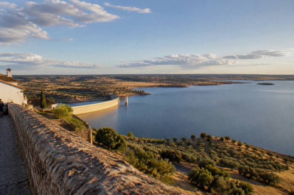 View over the Alqueva lake from the walls of Monsaraz at golden hour