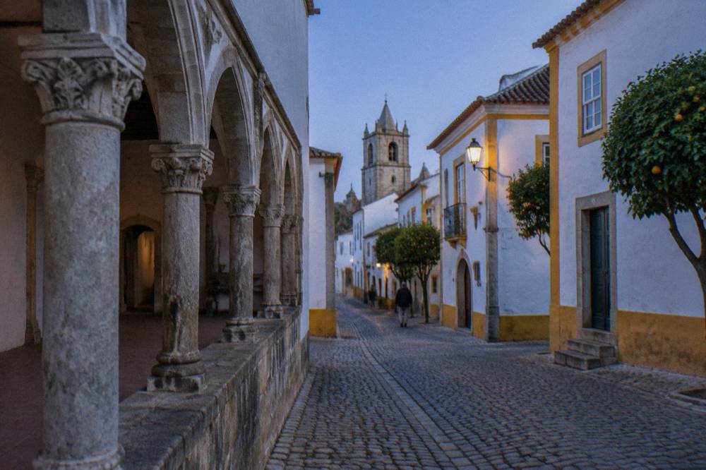 Cloister arcade of a Évora monument with carved stone arches