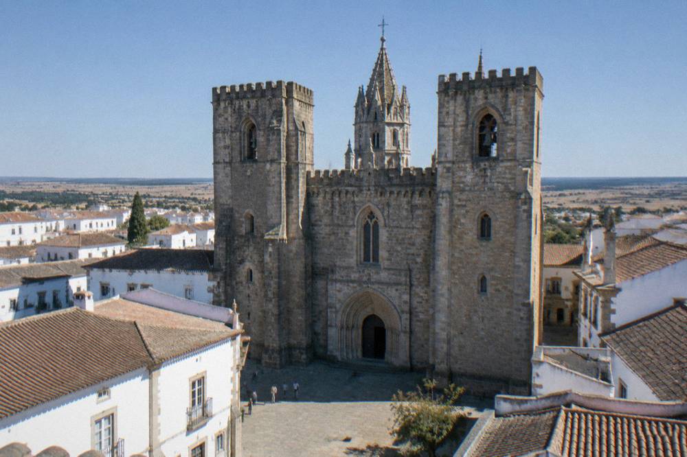 The Gothic interior and stone vaulting of the cathedral of Évora seen from the nave