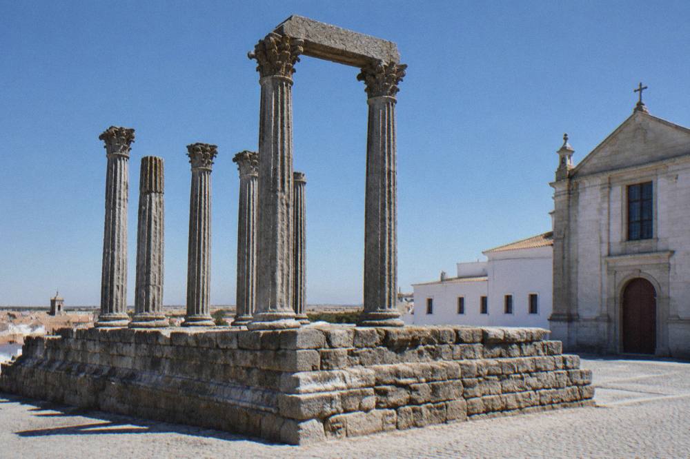 Close view of the granite columns and base of the Roman temple in Évora