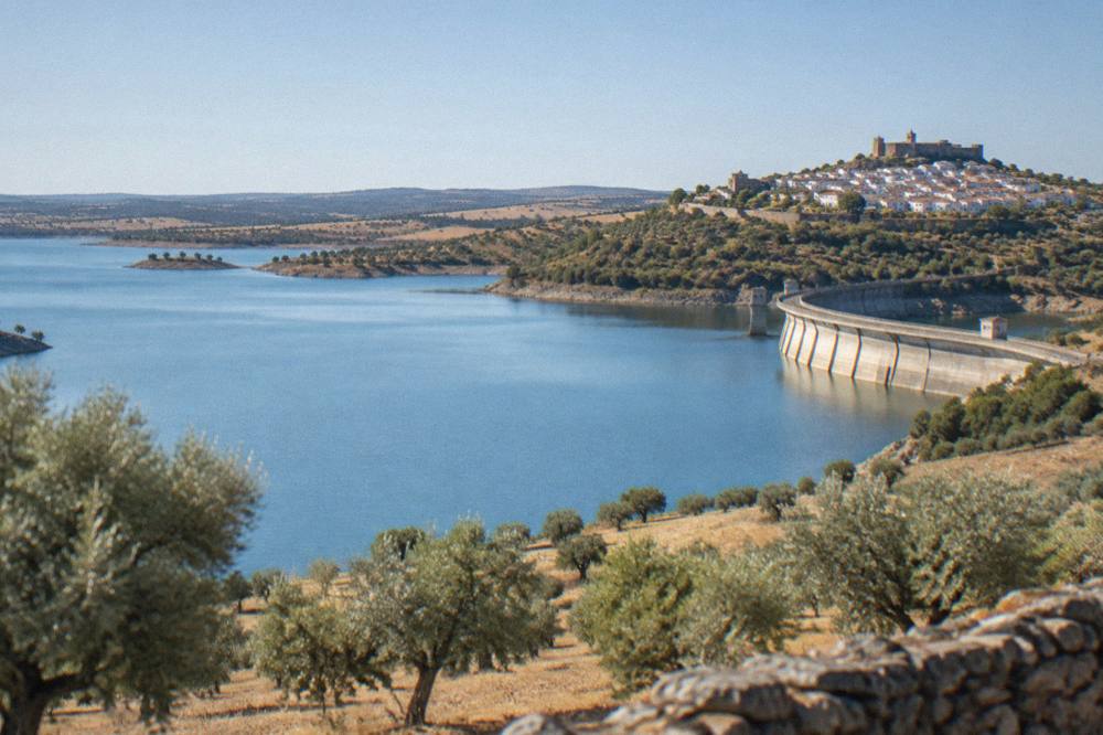 The walled village of Monsaraz above the Alqueva reservoir in late afternoon light