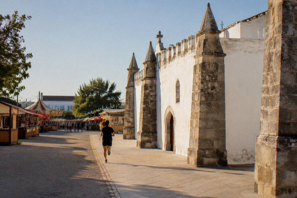 A festive fair with stalls and lights on the Rossio de São Brás in Évora