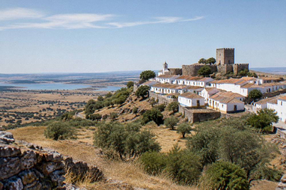 Walled hilltop village of Monsaraz seen across the Alentejo landscape