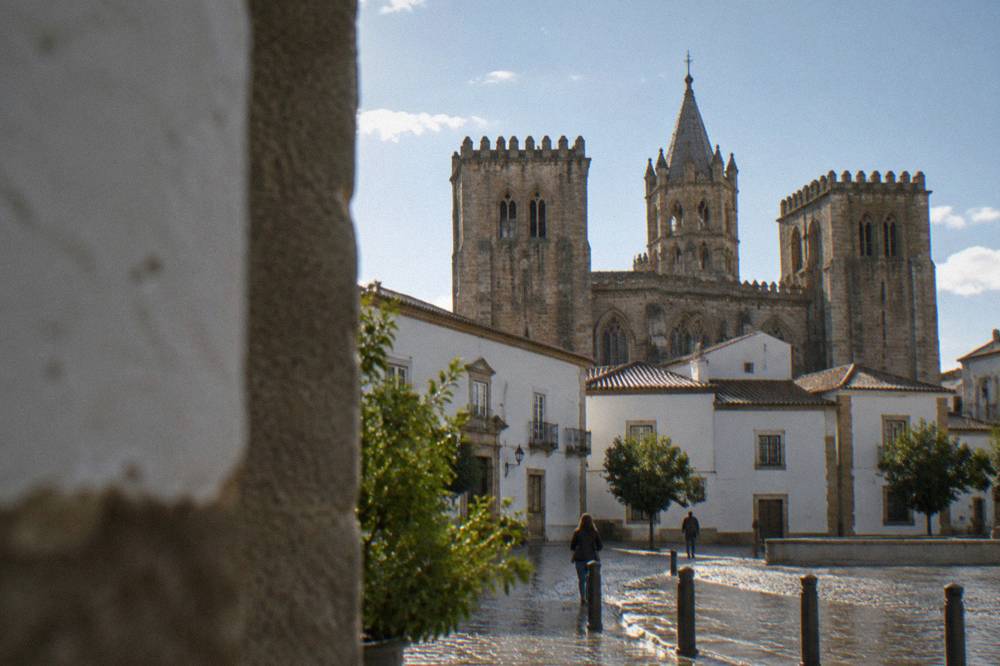 The Gothic towers of Évora Cathedral rising above the rooftops of the old town