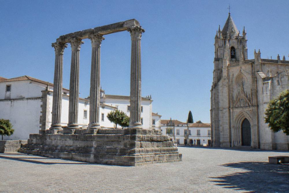 The Roman temple columns of Évora seen from the square beside the cathedral